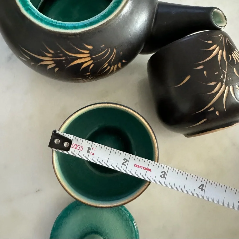Carved Vietnamese tea kettle set with 2 small tea cups